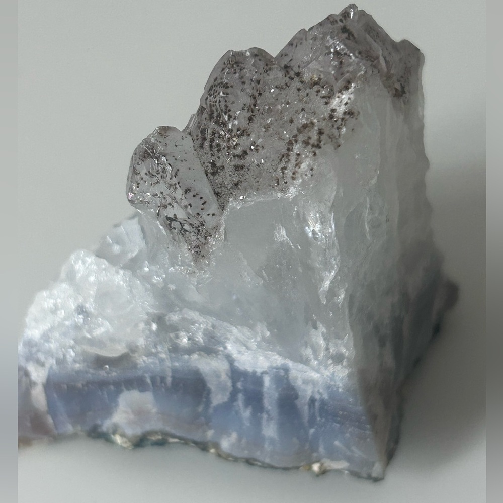 Speckled quartz cluster on top of agate with mini druzy cave